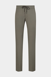 Vue sur fond blanc d'un pantalon jogpant en tissu technique de chez Olmetex kaki avec poches zippés et cordons de serrage.