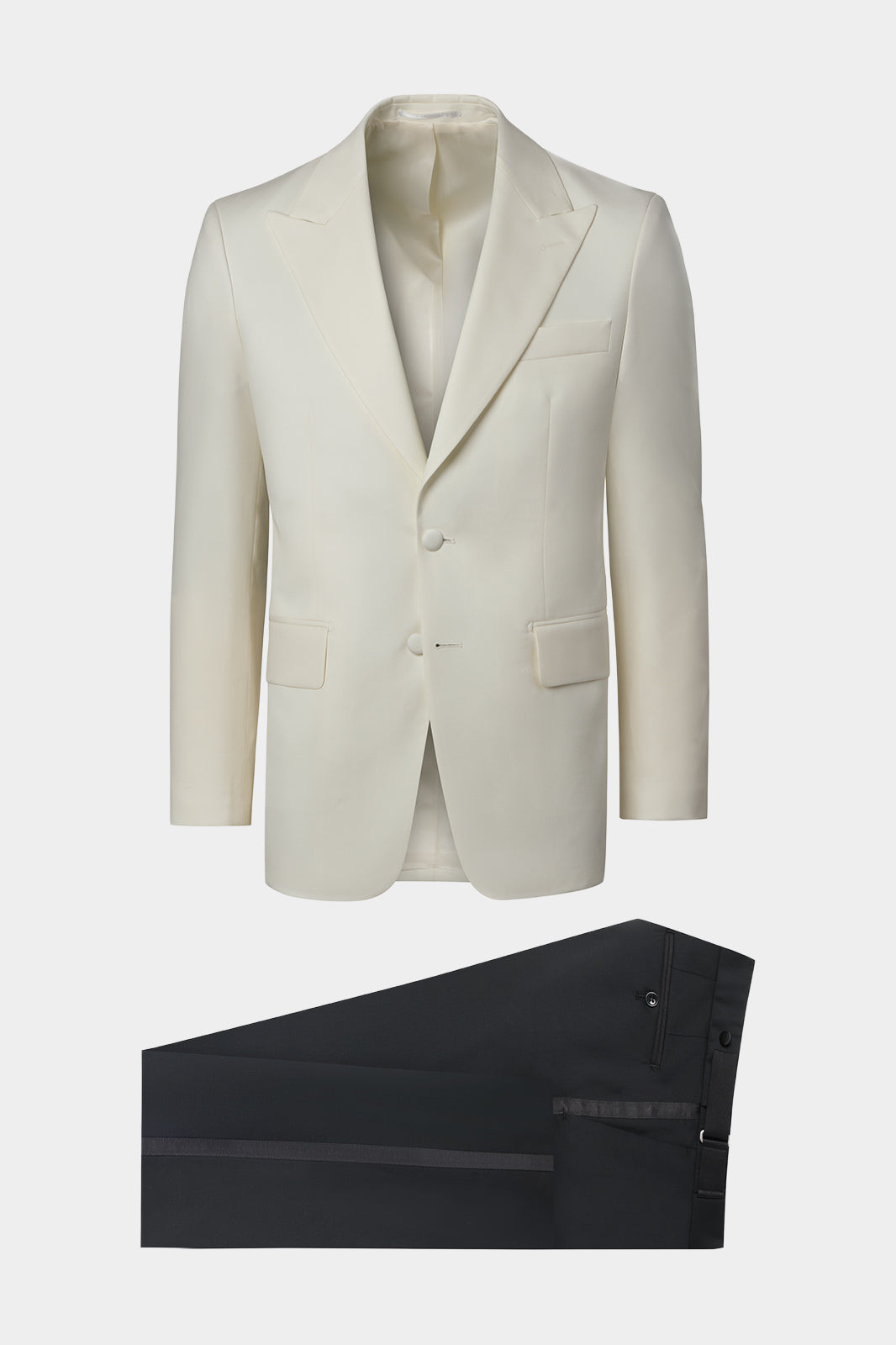 Vue sur fond blanc d'un smoking blanc et pantalon noir 