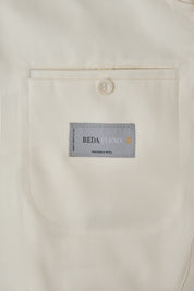 Smoking croisé blanc et pantalon noir