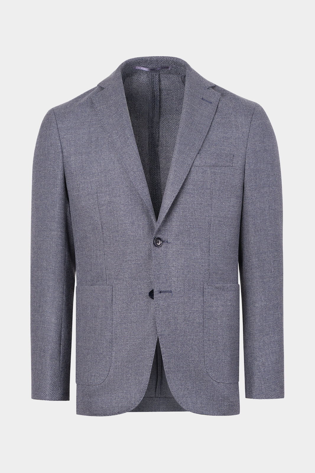 Vue sur fond blanc d'un blazer gris en laine et cachemire avec un tissu de chez E. Thomas. 