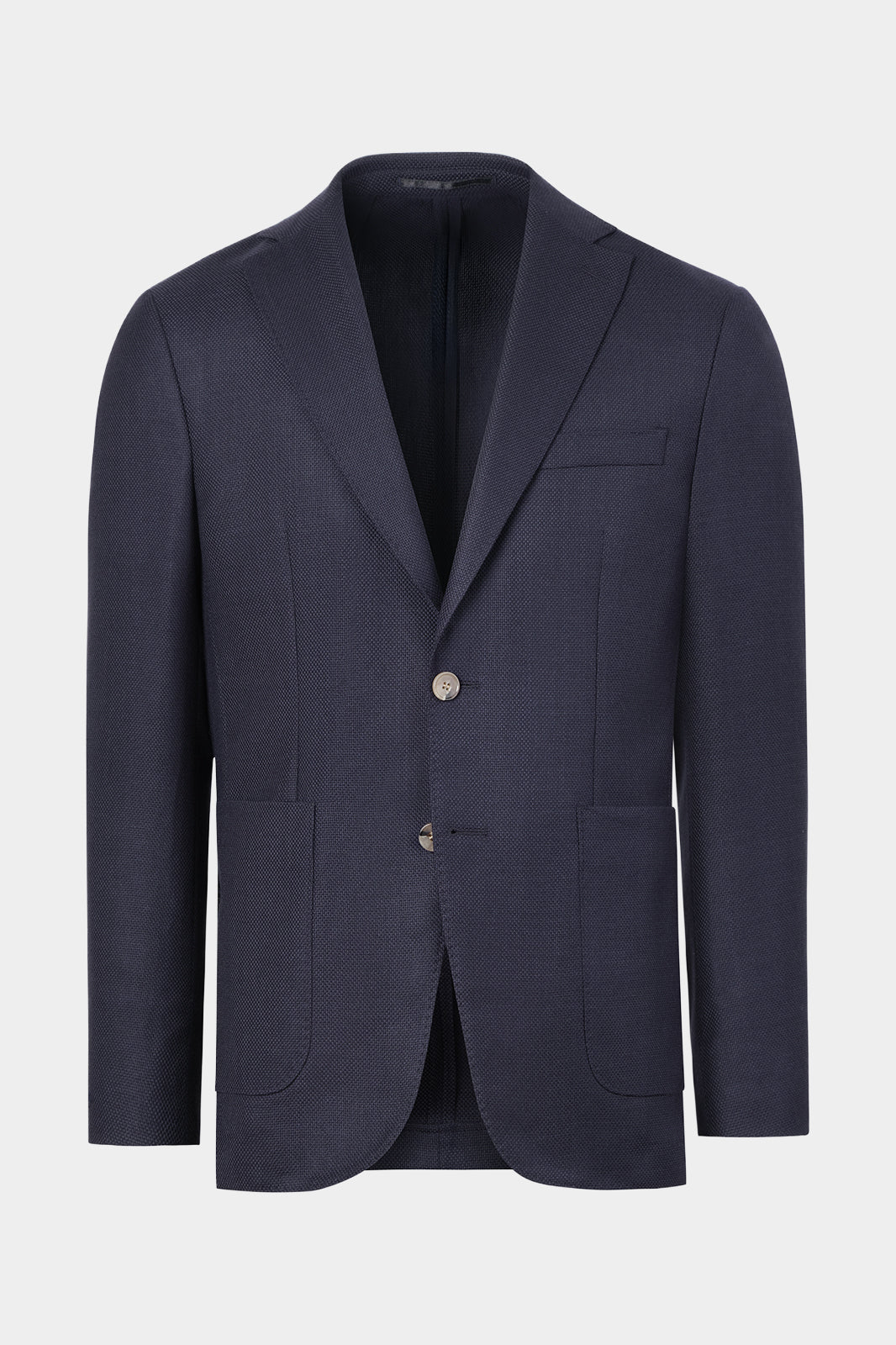 Vue sur fond blanc d'un blazer marine en laine et cachemire
Tissu de chez E. Thomas