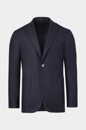 Vue sur fond blanc d'un blazer marine avec des poches plaquées en laine et cachemire.