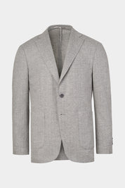 Vue sur fond blanc d'un blazer en laine et cachemire en gris clair