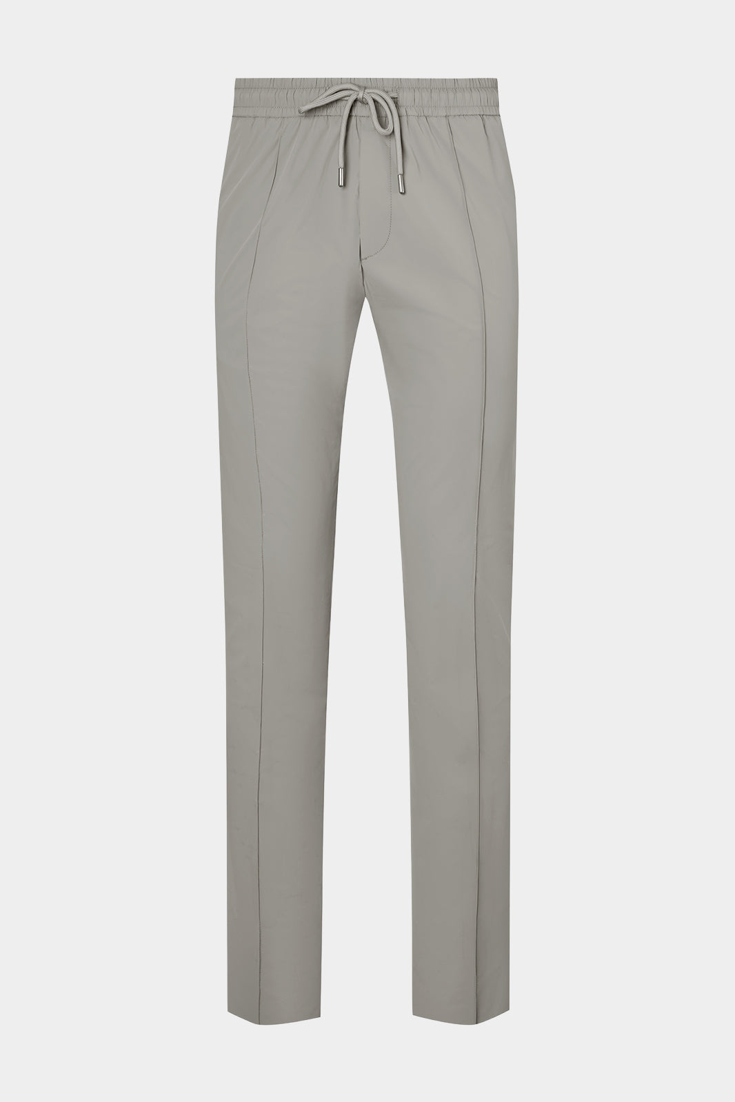 Vue sur fond blanc d'un pantalon jogpant Donatela de couleur gris clair. Sur un tissu italien en 77% polyamide 23% élasthanne de chez Olmetex.