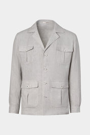Vue sur fond blanc d'une veste saharienne à motif Prince de Galles gris en tissu 100% lin d'Italie de chez LeoMaster. Elle possède 4 poches à rabat, ainsi qu'une fermeture à boutons et poignets boutonnés.