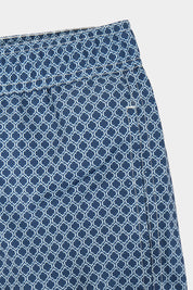Kids' navy swim shorts with wave pattern