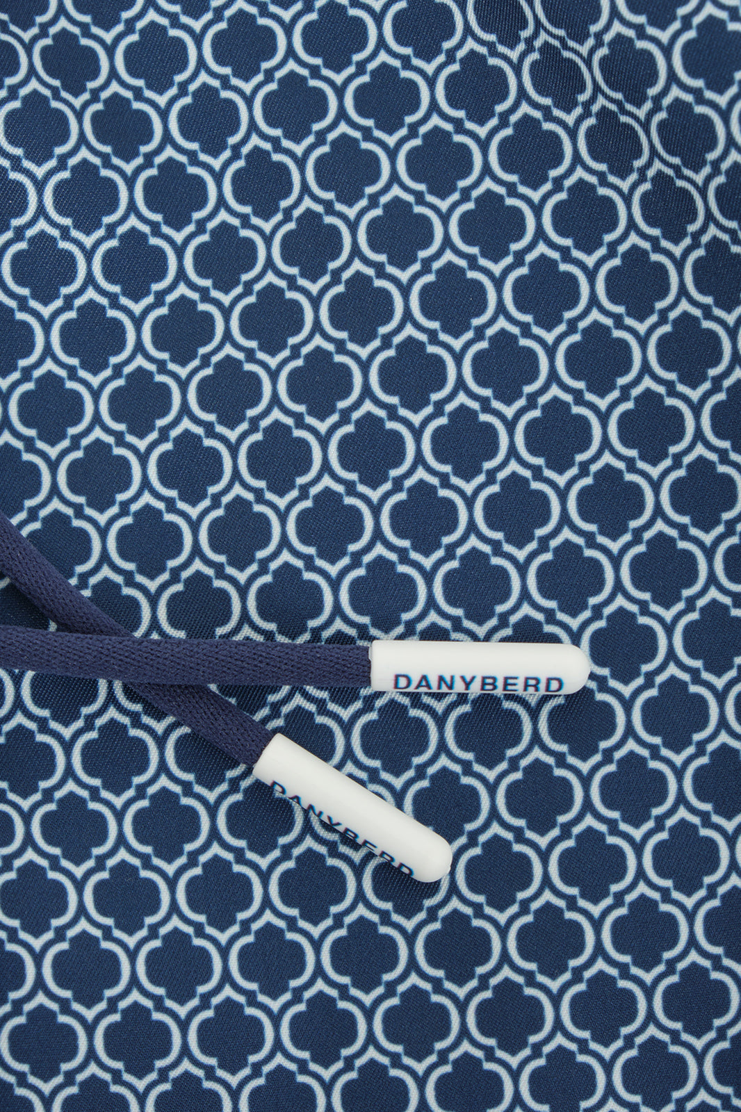 Kids' navy swim shorts with wave pattern