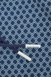 Kids' navy swim shorts with wave pattern