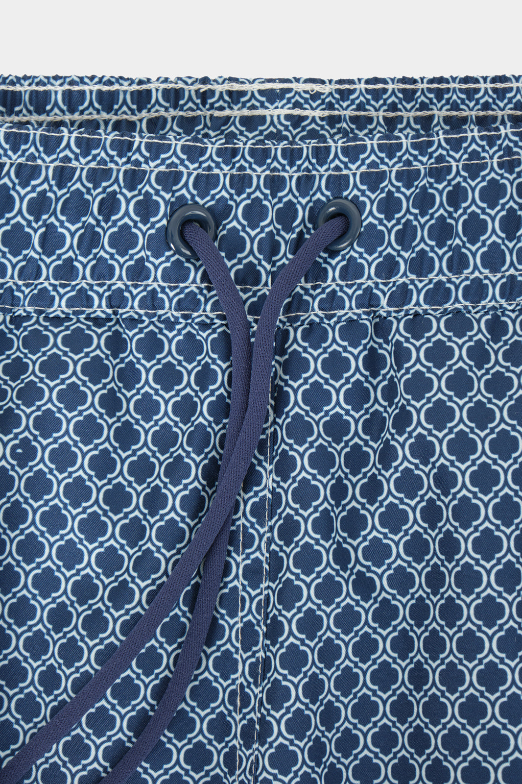 Navy swim shorts with wave pattern