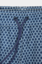Navy swim shorts with wave pattern