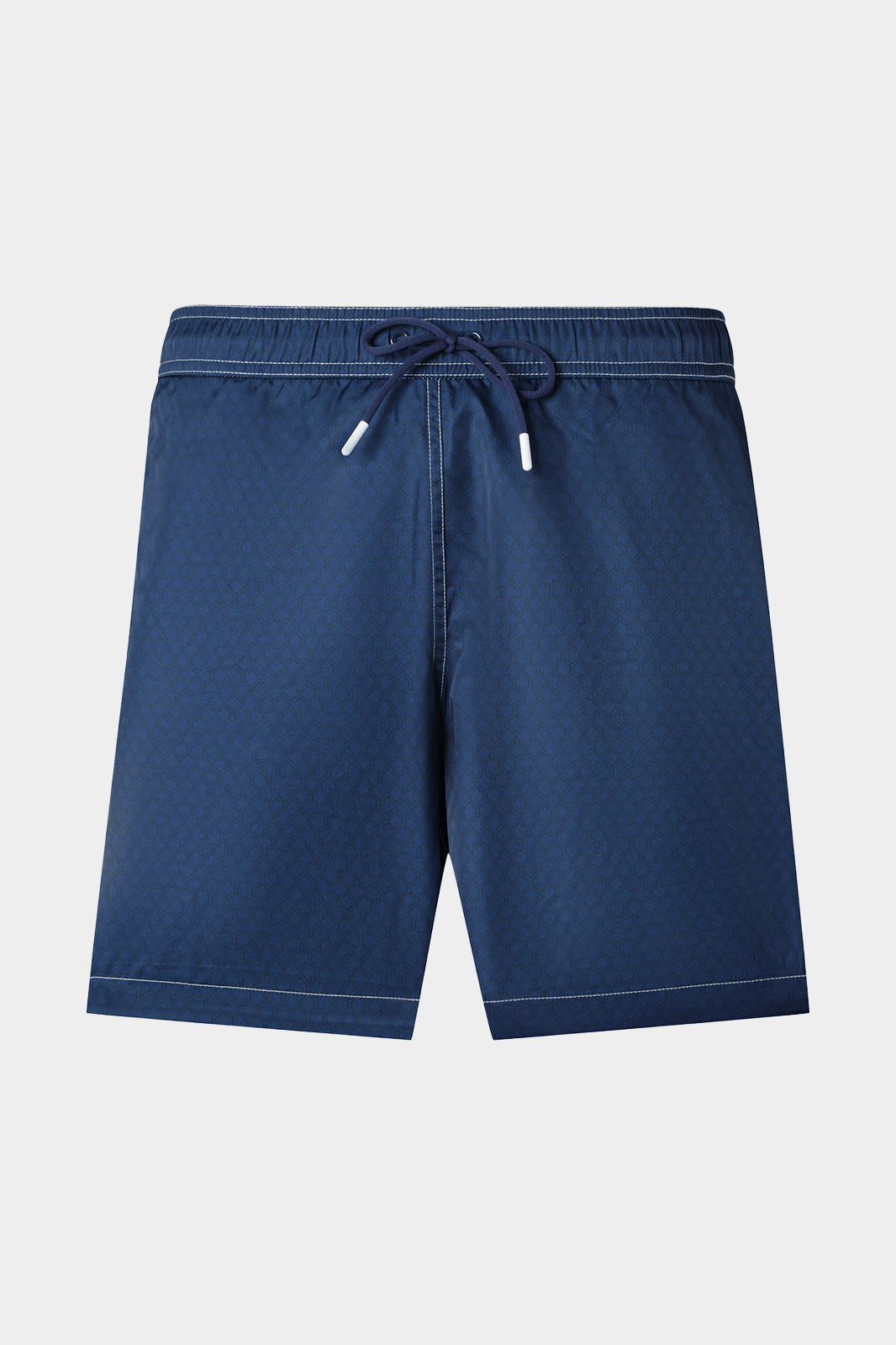 Vue sur fond blanc d'un short de bain couleur indigo. Avec tissu à séchage rapide en 100% polyester.