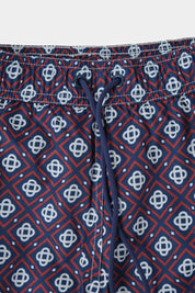 Short de bain marine à losange rouge