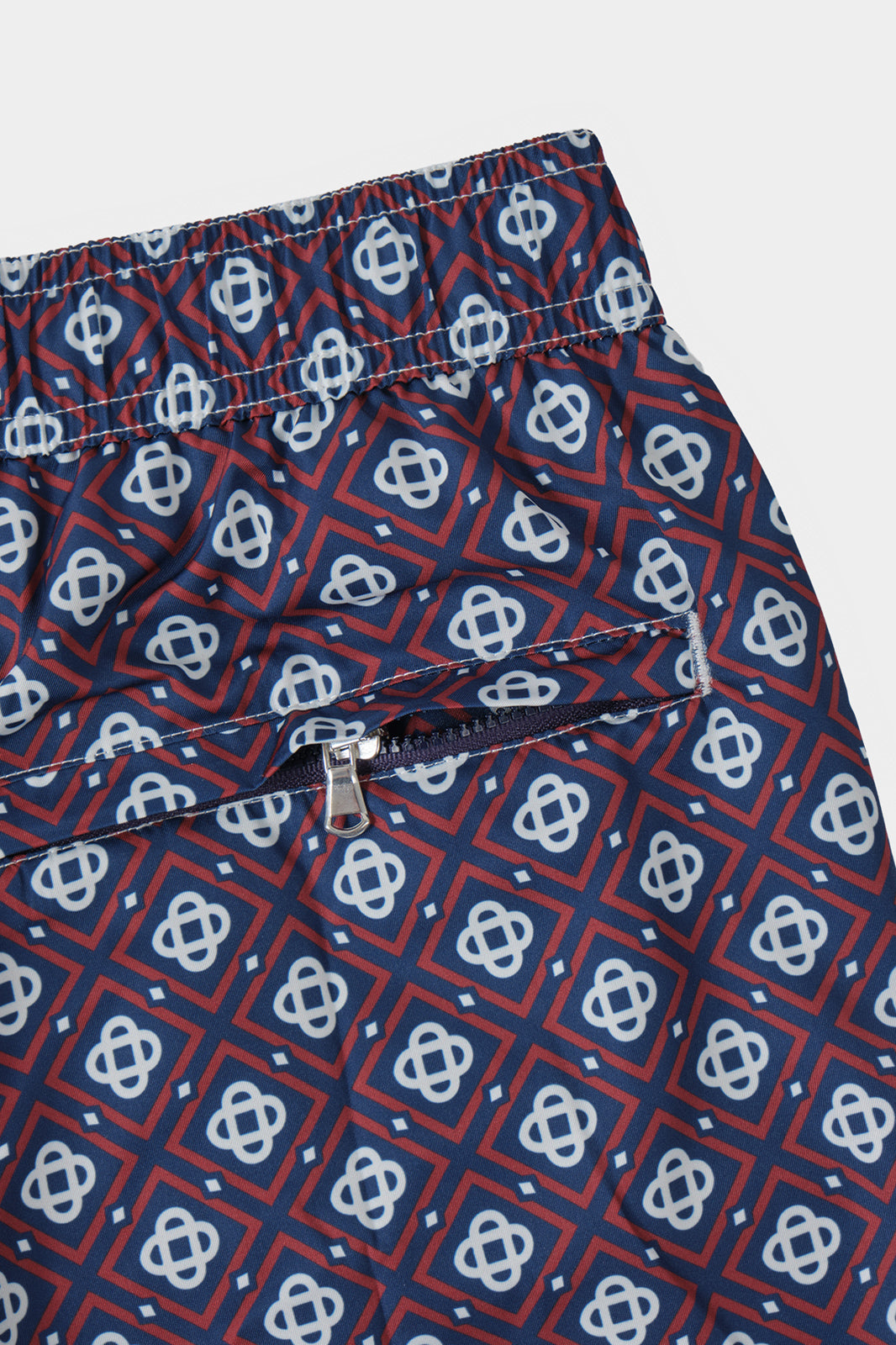 Short de bain marine à losange rouge