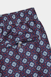Short de bain marine à losange rouge