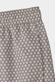 Short de bain blanc à motif marron
