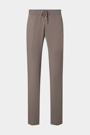 Vue sur fond blanc d'un pantalon jogpant technique poches zippées en taupe