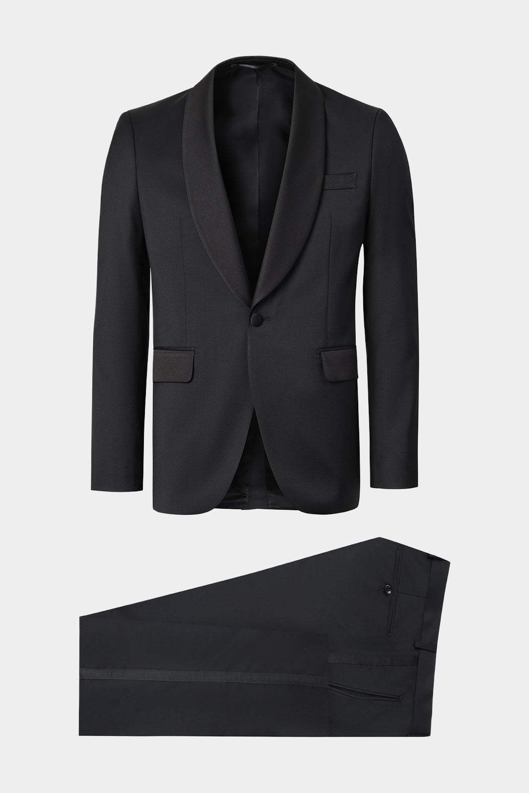 Vue sur fond blanc d'un smoking stretch col châle en noir avec un tissu de chez Reda