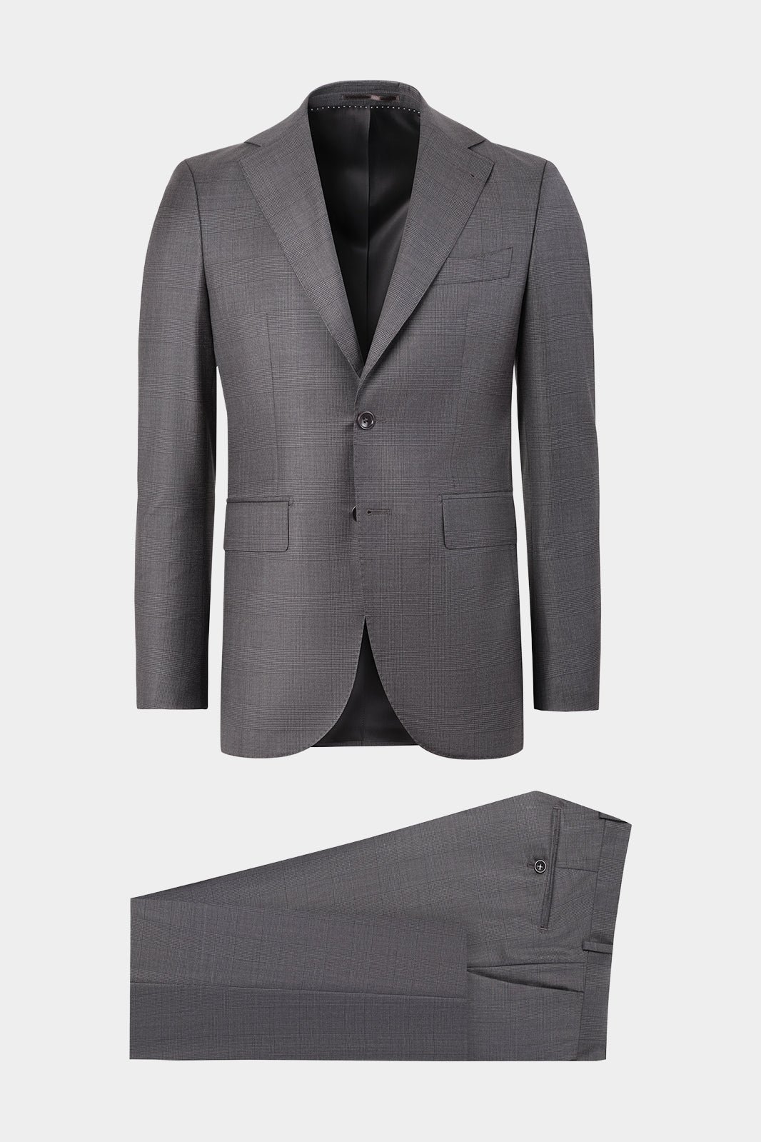 Vue sur fond blanc d'un costume revers large - Prince de Galles sur un tissu italien de chez Reda en coupe cintré 2 boutons.