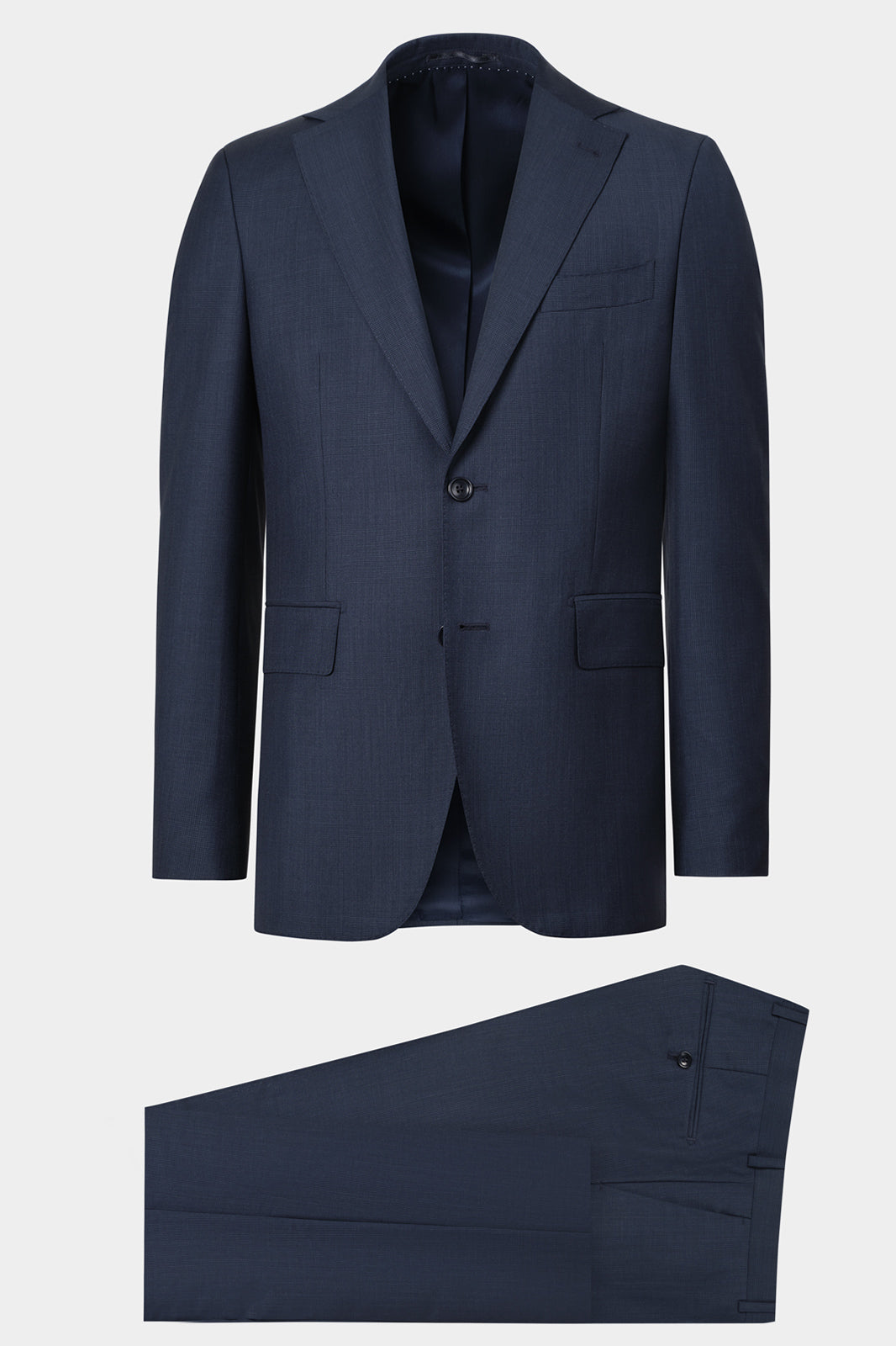 Vue sur fond blanc d'un costume laine et mohair - Prince de Galles marine. En 75% laine et 25% mohair d'Italie.