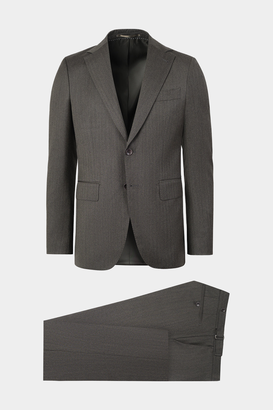 Vue sur fond blanc d'un costume avec pantalon patte de serrage de couleur vert foncé avec une trame chevron sur un tissu italien 100% laine vierge de chez Reda.