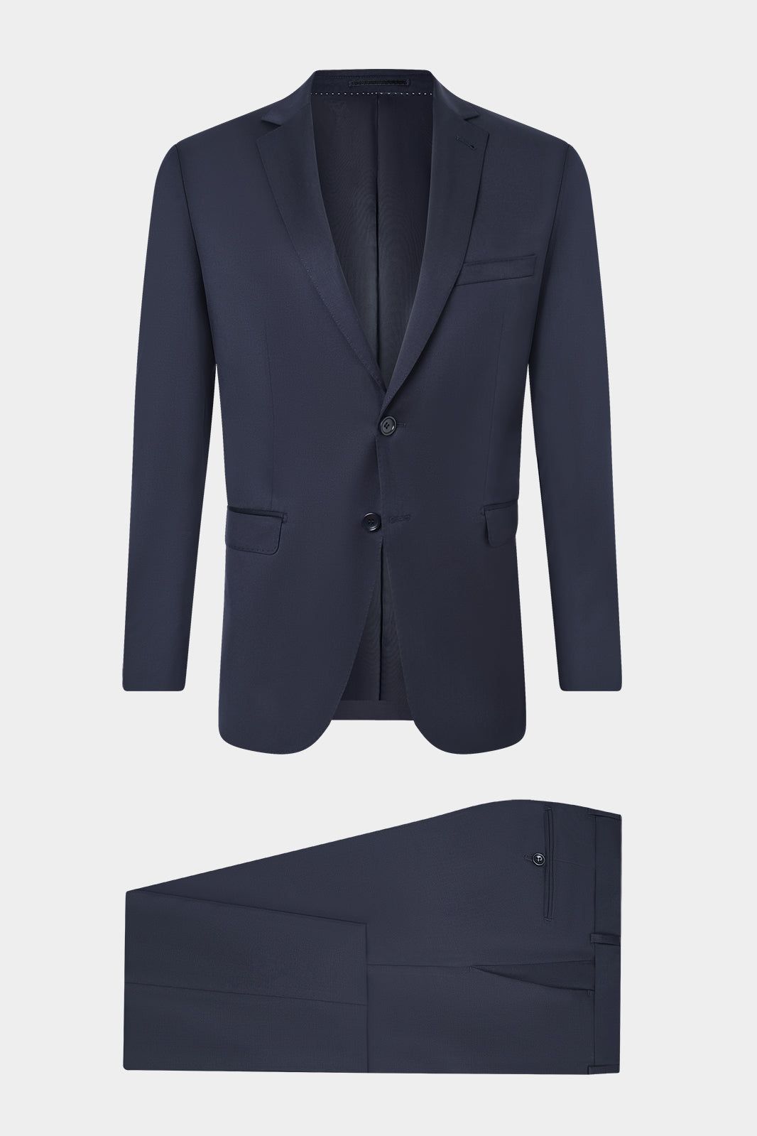 Découvrez notre costume coupe non-cintrée en 100% laine de chez Vitale Barberis Canonico. Il est composé d'une veste revers fin à 2 boutons avec épaulette et doublée avec les poches à rabat sur le devant, et d'un pantalon à coupe traditionnelle. Il est essentiel à votre garde, idéal par sa simplicité et fonctionnel par sa coupe.